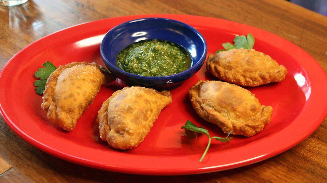 The Ropa Vieja Empanada ($12) is beef brisket, ropa vieja, Oaxaca cheese, Anaheim cabbage slaw, pinto bean puree and cilantro lime aioli.