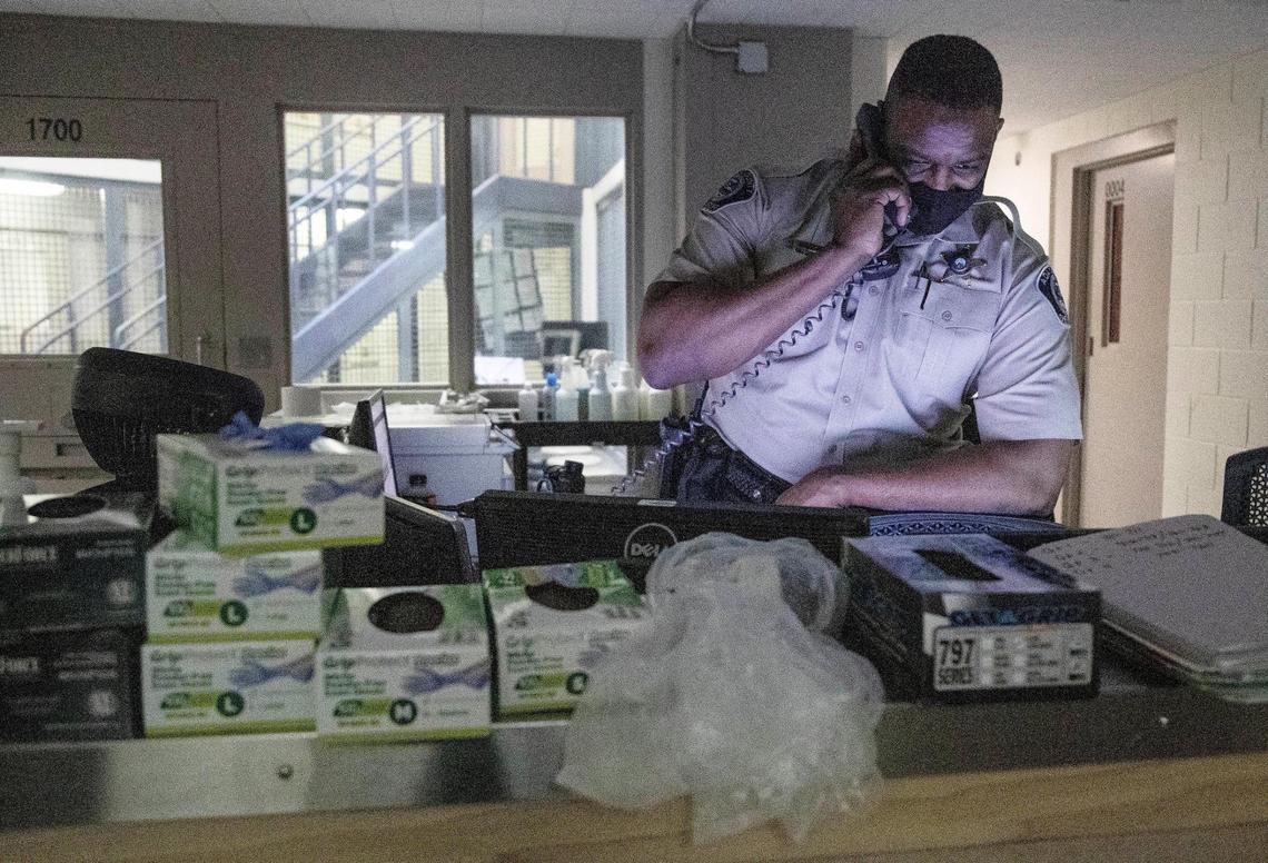 Sheriff Deputy Billy Fikes wears a face mask as he works at the maximum security dorm in the Ada County Jail on Friday. Sheriff Matt Clifford says a jail expansion will be needed as the number of inmates is expected to grow along with the county’s overall population growth.