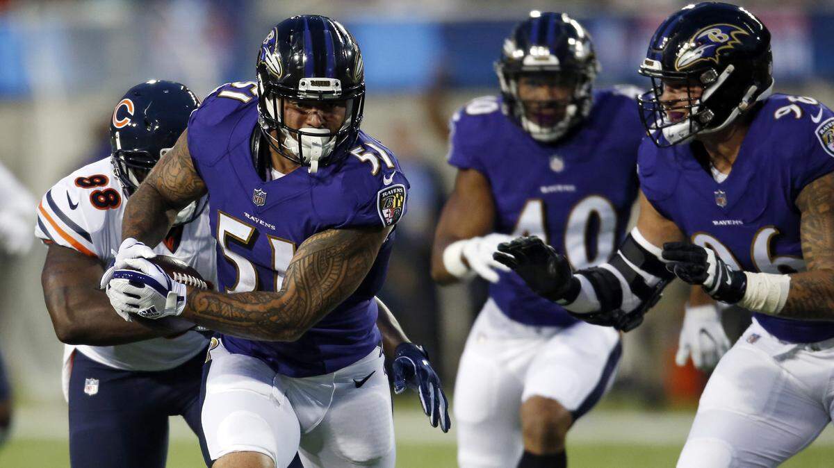 In this Thursday, Aug. 2, 2018, file photo, Baltimore Ravens linebacker Kamalei Correa (51) runs after an interception against the Chicago Bears during the first half at the Pro Football Hall of Fame NFL preseason game in Canton, Ohio.
