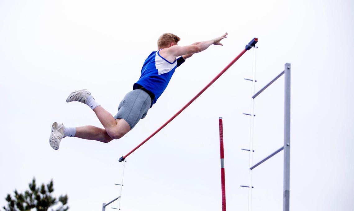 Emmett’s Landon Helms clears 15 feet in the pole vault during the final day of the 4A District Three track and field championships at Bishop Kelly High on Saturday, May 15, 2021.