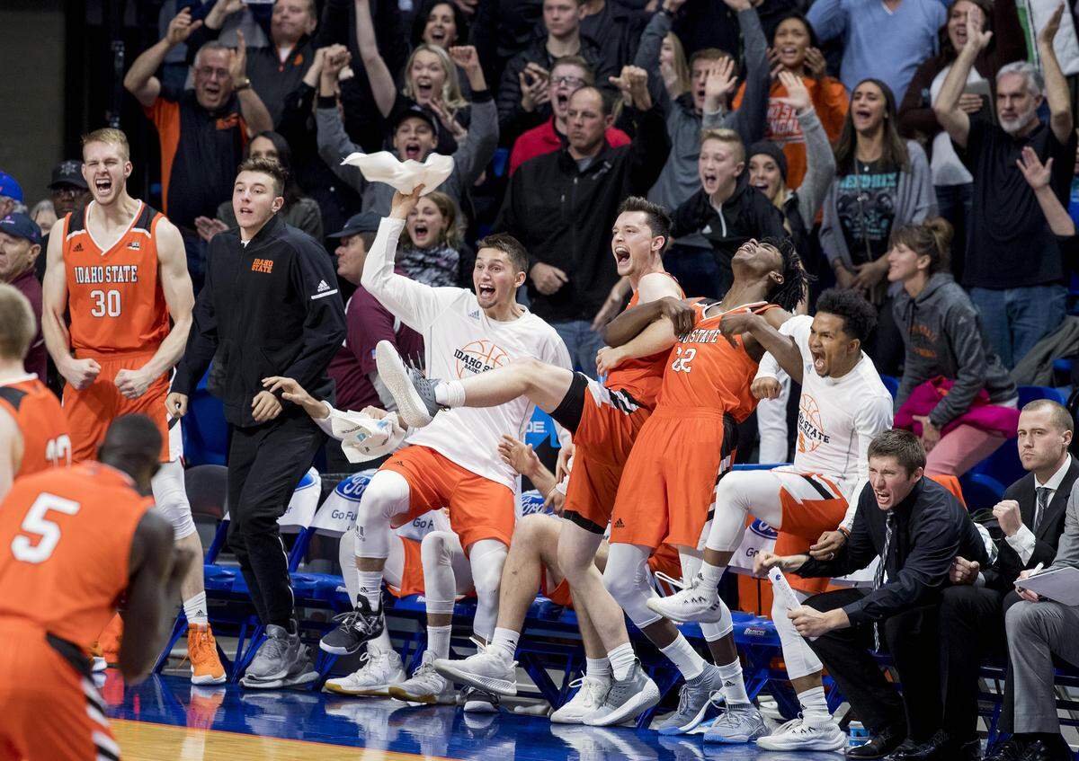 Idaho State’s bench and fans celebrate a 72-70 upset win over Boise State Saturday, Nov. 10, 2018 at Taco Bell Arena in Boise.
