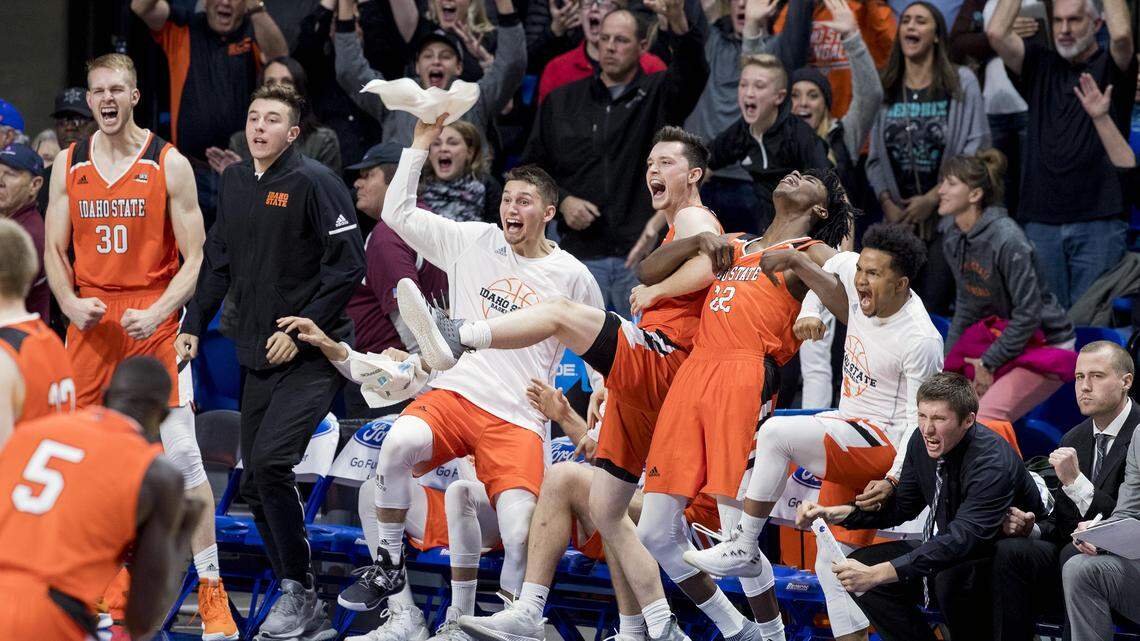 Idaho State’s bench and fans celebrate a 72-70 upset win over Boise State on Nov. 10, 2018, at Taco Bell Arena in Boise.