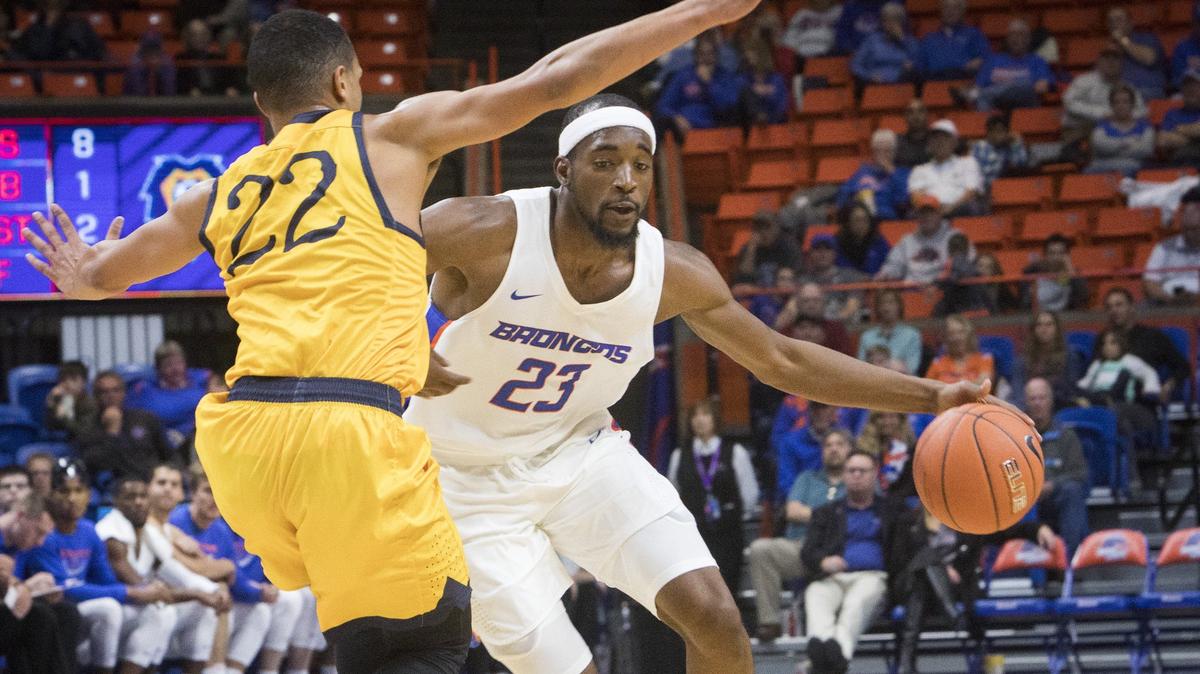 Boise State’s RJ Williams drives around Vanguard’s Brandon Brothers during the Broncos’ 89-63 exhibition win Monday at Taco Bell Arena in Boise. Williams finished with 16 points, eight rebounds and three assists.