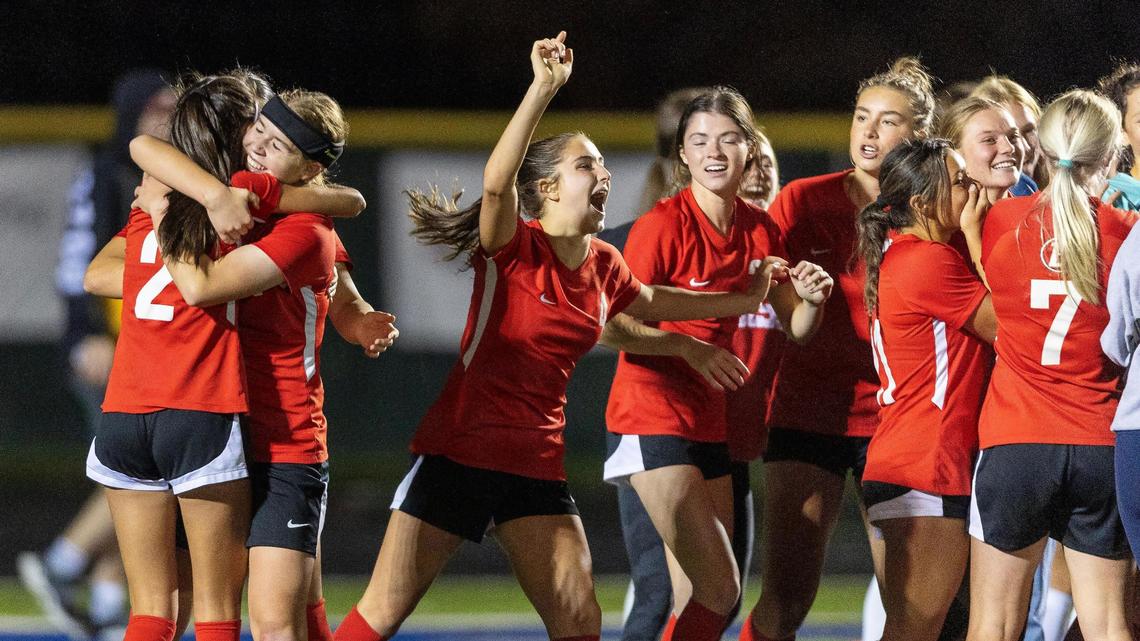 Boise’s Nolyn Cromie, left, and Mia Barron embrace after Cromie clinched the Brave back-to-back district titles with a victory in a sudden-death shootout Wednesday at Mountain View High.