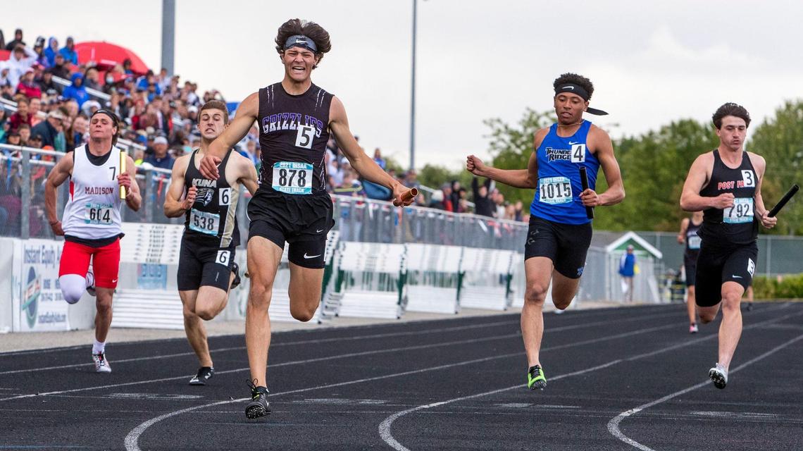 Rocky Mountain’s Brock Gray celebrates crossing the 4x100 relay finish line, a team win that helped the Grizzlies win the 5A state track team title Saturday, May 22, 2021, at Eagle High School.