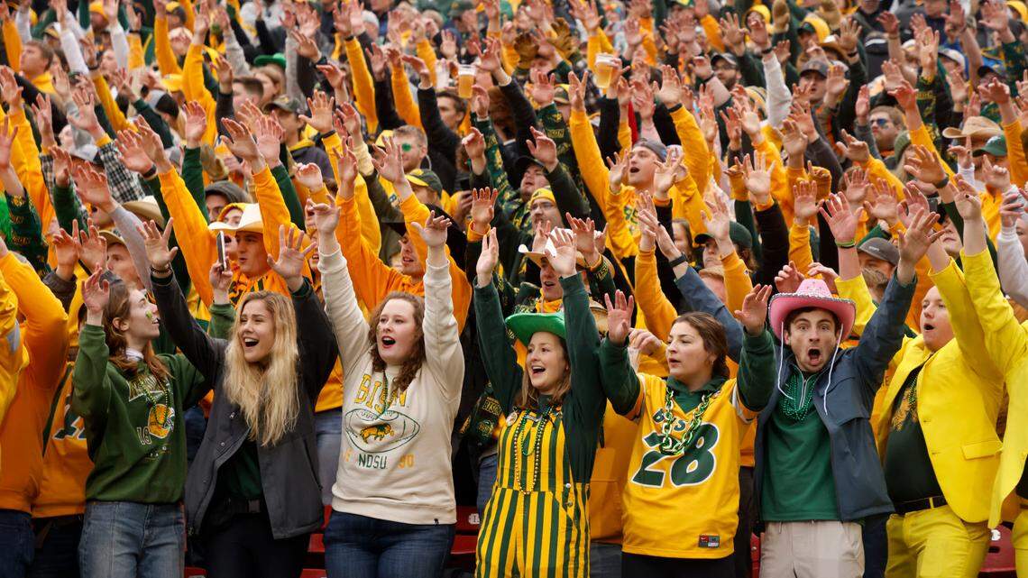 North Dakota State fans cheer during the first half of the 2022 FCS National Championship game against Montana State in Frisco, Texas. The Bison have won 9 national titles since 2011.