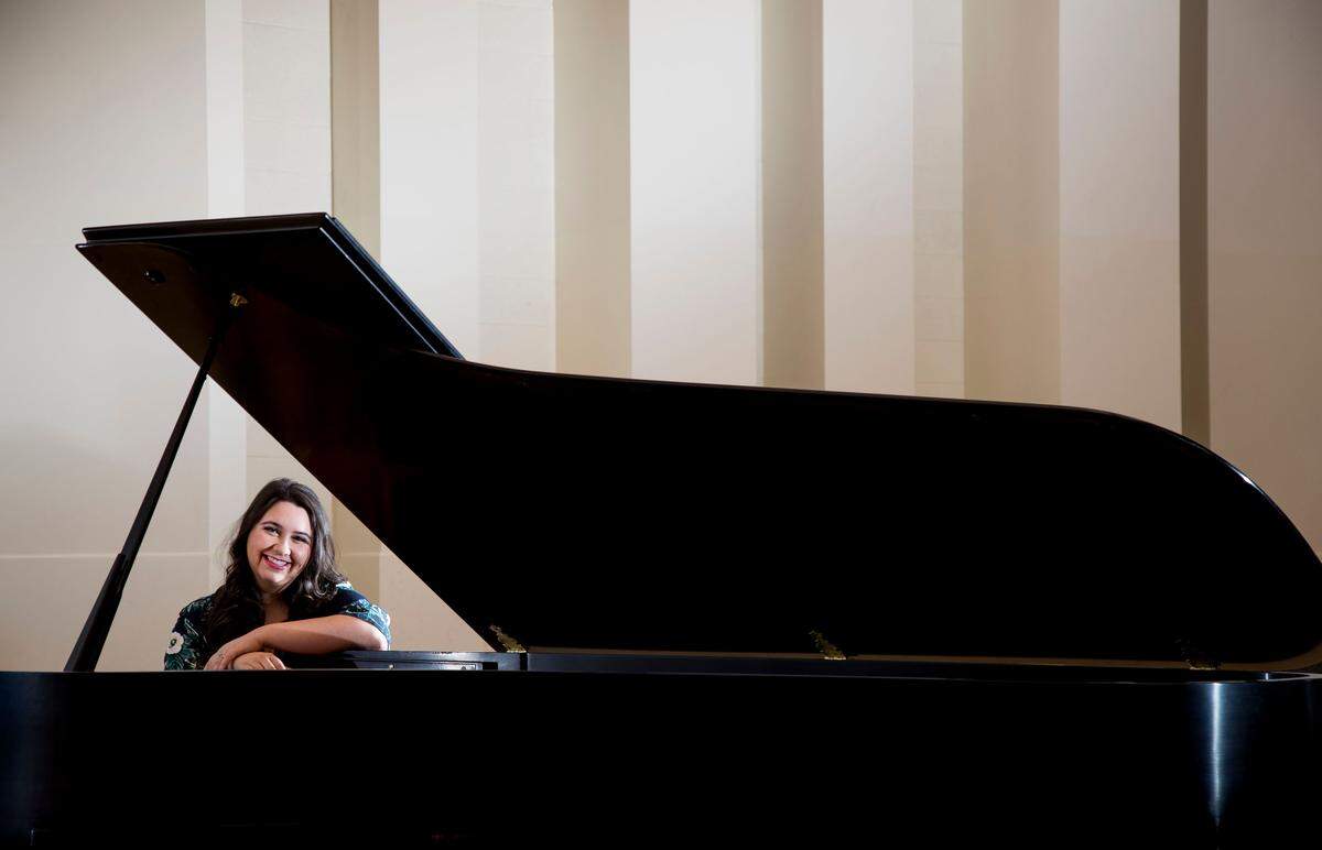 Stephanie Zickau, 26, is a pianist, cellist and harpist with 208 ensemble.