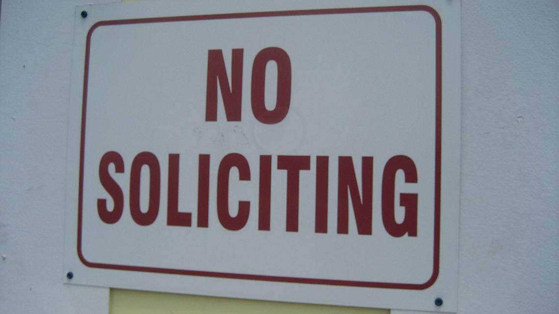 Will my “no soliciting” sign stop sales people from knocking on my door in Wichita? Here’s what to know about your door-to-door sales in Kansas?