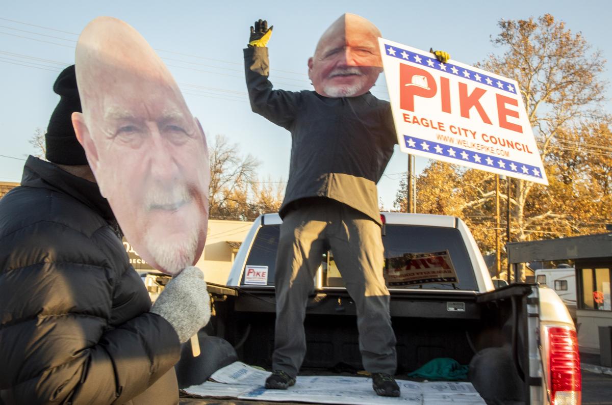 Mark Rodriguez dances away during the morning commute at Eagle Road and State Street. “Dancing like nobody’s watching,” he quipped, since he was the only one who couldn’t see. “Get out and vote. It’s an American thing.” Bob George, left, also dons a likeness of Eagle City Council candidate Brad Pike, a personal friend.