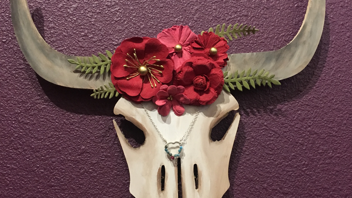 A variety of artwork is donated to Valentine for AIDS, the silent art auction to benefit SNAP. Pictured: Angie Sebolt - “Ode to O’keefe”