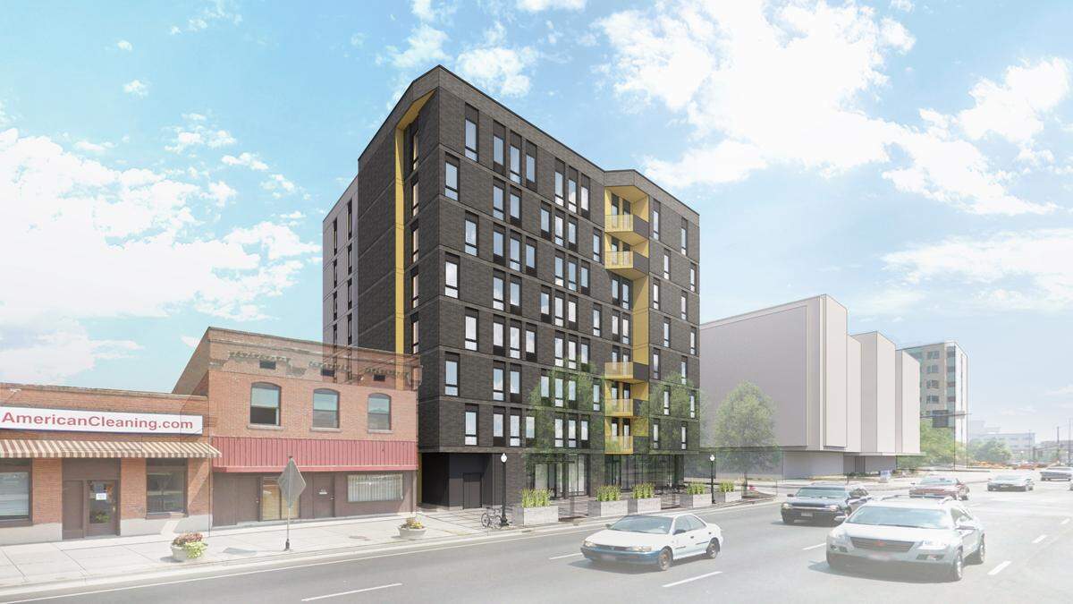 Visum Development Group of Ithaca, New York is building an eight-story, 76-unit apartment building at the corner of 6th and Front Streets. Construction stalled briefly this spring, but has restarted. Here, an artist’s rendering of the proposed building facing Front Street. 