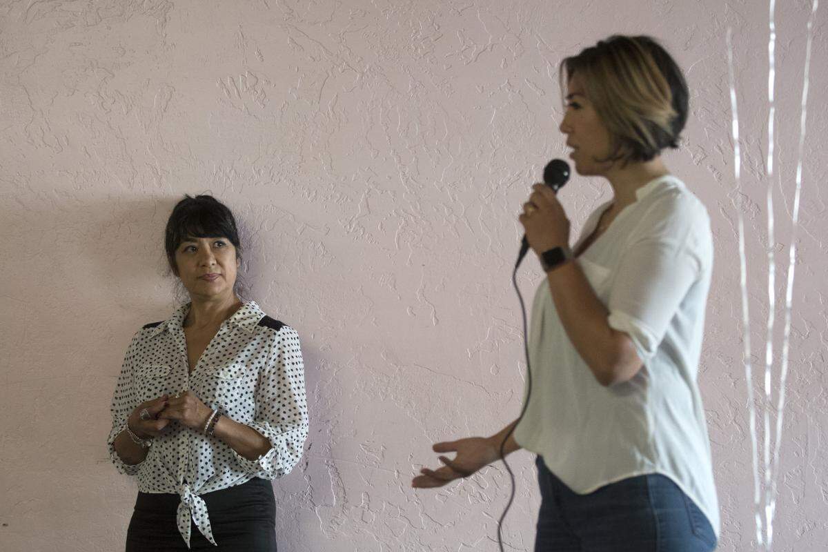 Organizer Maria Bucklew listens to Democratic gubernatorial candidate Paulette Jordan during the Southern Idaho Progressive Coalition Lighting the Path to the Future event Sunday, Aug. 19, 2018, at El Sombrero Restaurant in Jerome.
