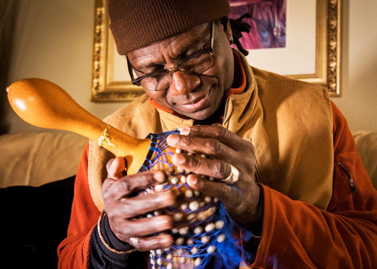 Dayo Ayodele, 58, is an artist and community builder. He founded Global Lounge and plays with Afrosonics.