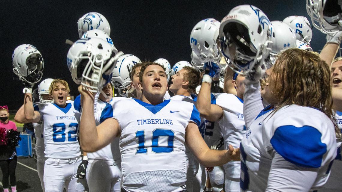 Quarterback Max Spielman leads Timberline’s postgame cheer after a 27-20 win over Skyview in the first round of the 5A state playoffs on Friday, Oct. 30, 2020.