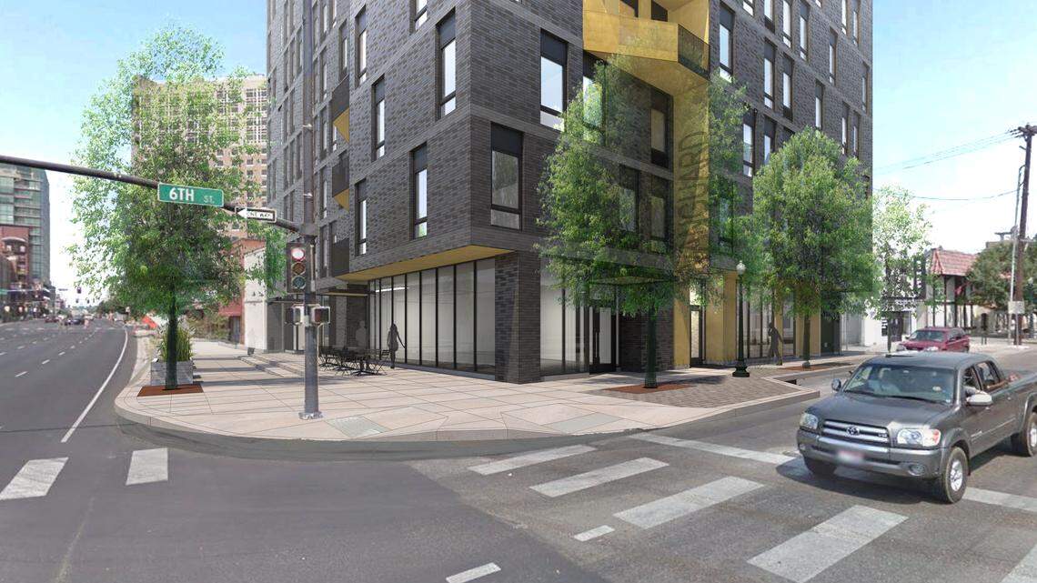 The eight-story building from Visum Development Group at 600 W. Front St., would have retail shops on the ground floor and apartments on the upper floors. This view is looking west from Front Street at North 6th.