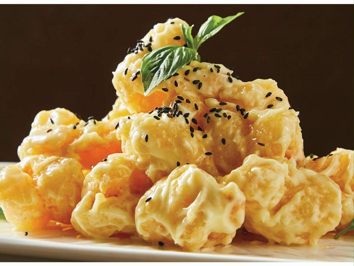 Mustard prawns ($15.99) are among the menu options.
