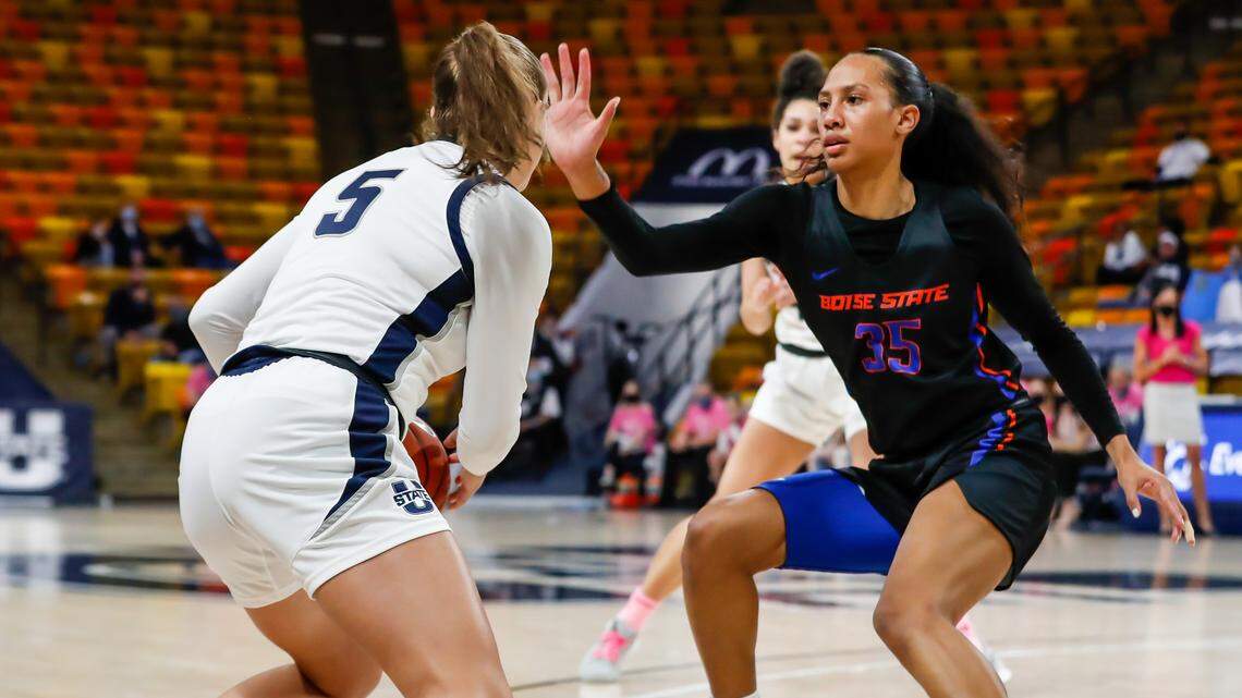 Freshman forward Alexis Mark, right, had seven points and a team-best 13 rebounds in Boise State’s 81-72 win over Utah State on Saturday at Dee Glen Smith Spectrum in Logan, Utah.