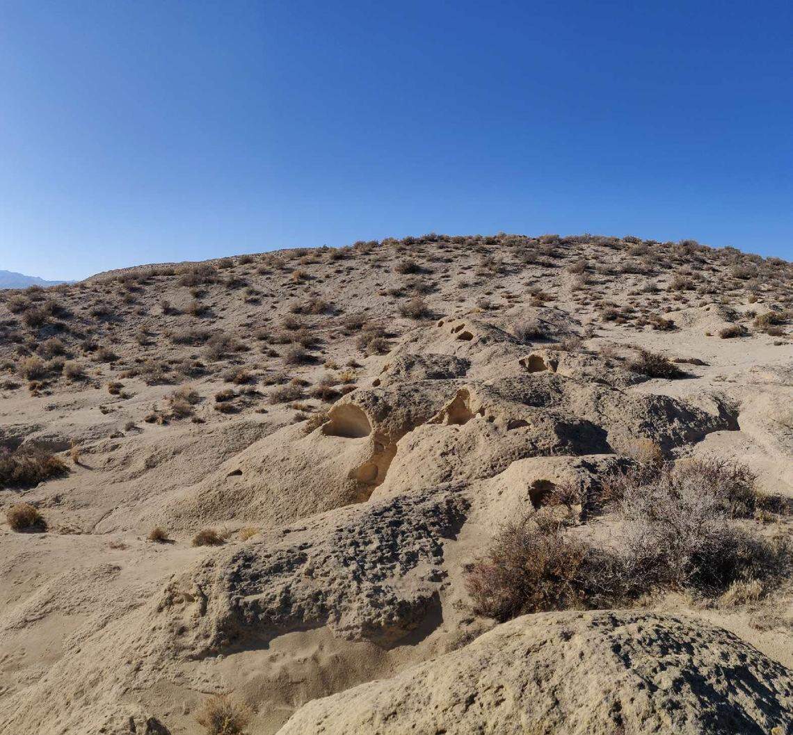 Ooids, which are sediment-covered grains of sand, form strange oolite rock formations near Grand View, Idaho, like the domes seen here.