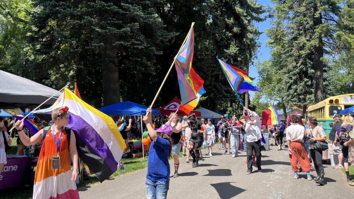 A parade takes place Saturday at City Park in downtown Coeur d’ Alene during the Pride in the Park event.