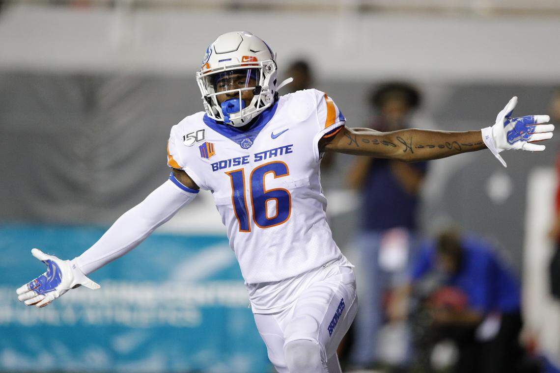 Boise State wide receiver John Hightower celebrates after scoring a touchdown against UNLV on Oct. 5, 2019, in Las Vegas. His uncovered left arm includes the tattoo “Long Live Slim,” a tribute to friend Marcelle Preston.