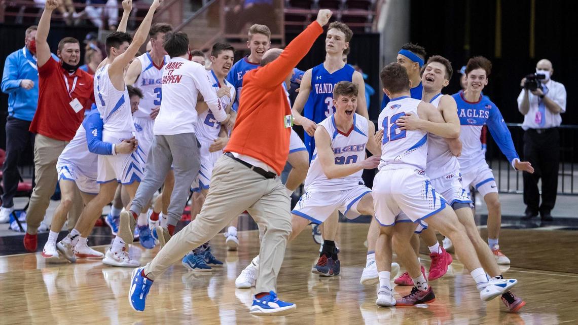 Marsh Valley celebrates at the final buzzer after defeating McCall-Donnelly 58-51 in the 3A boys basketball state championship Saturday at the Ford Idaho Center in Nampa.