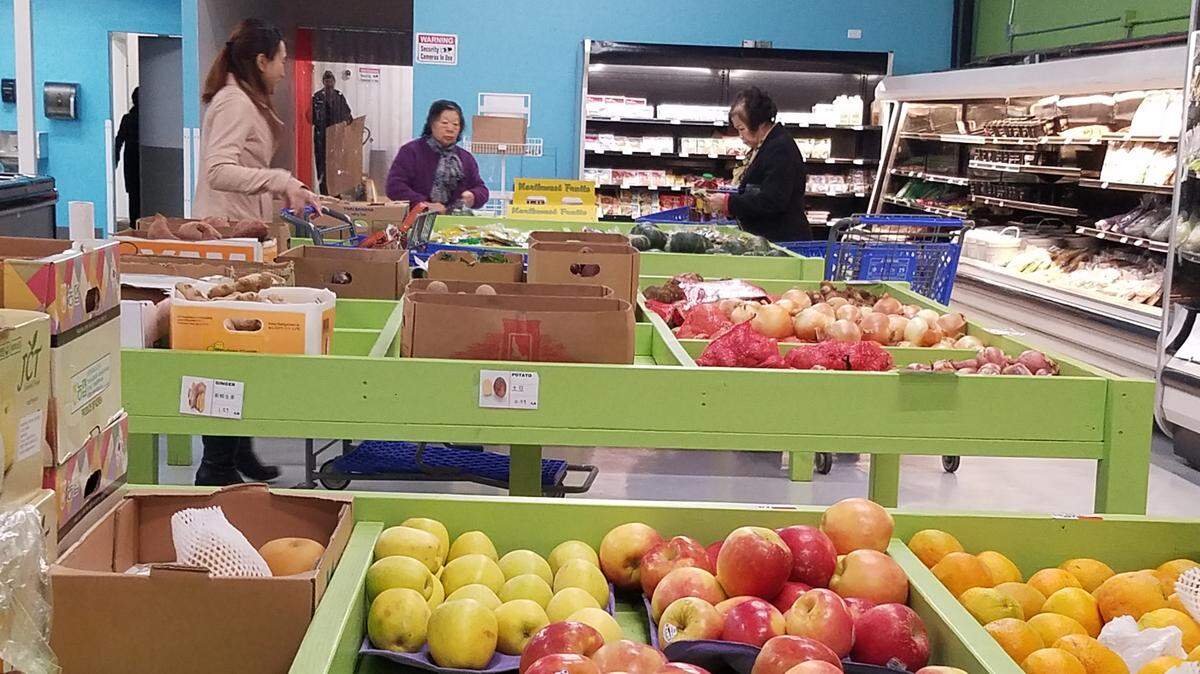 Shoppers eye produce at the Idaho Capital Asian Market in Boise. The grocery store held a soft opening a couple of weeks ago and is continuing to add new products and getting fresh meat and seafood cases ready.