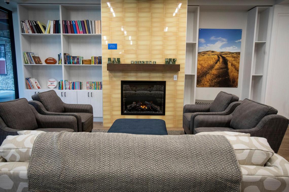 The family room in the new Ronald McDonald House is an important place for visitors to relax, socialize and share stories. Photographs by Boise photographer Mark VanderSys are hung throughout the building.
