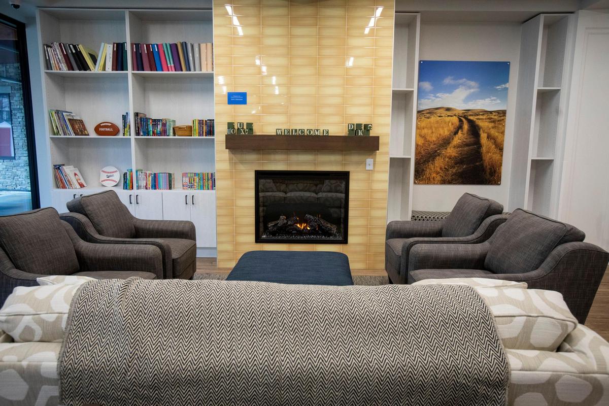 The family room in the new Ronald McDonald House is an important place for visitors to relax, socialize and share stories. Photographs by Boise photographer Mark VanderSys are hung throughout the building.