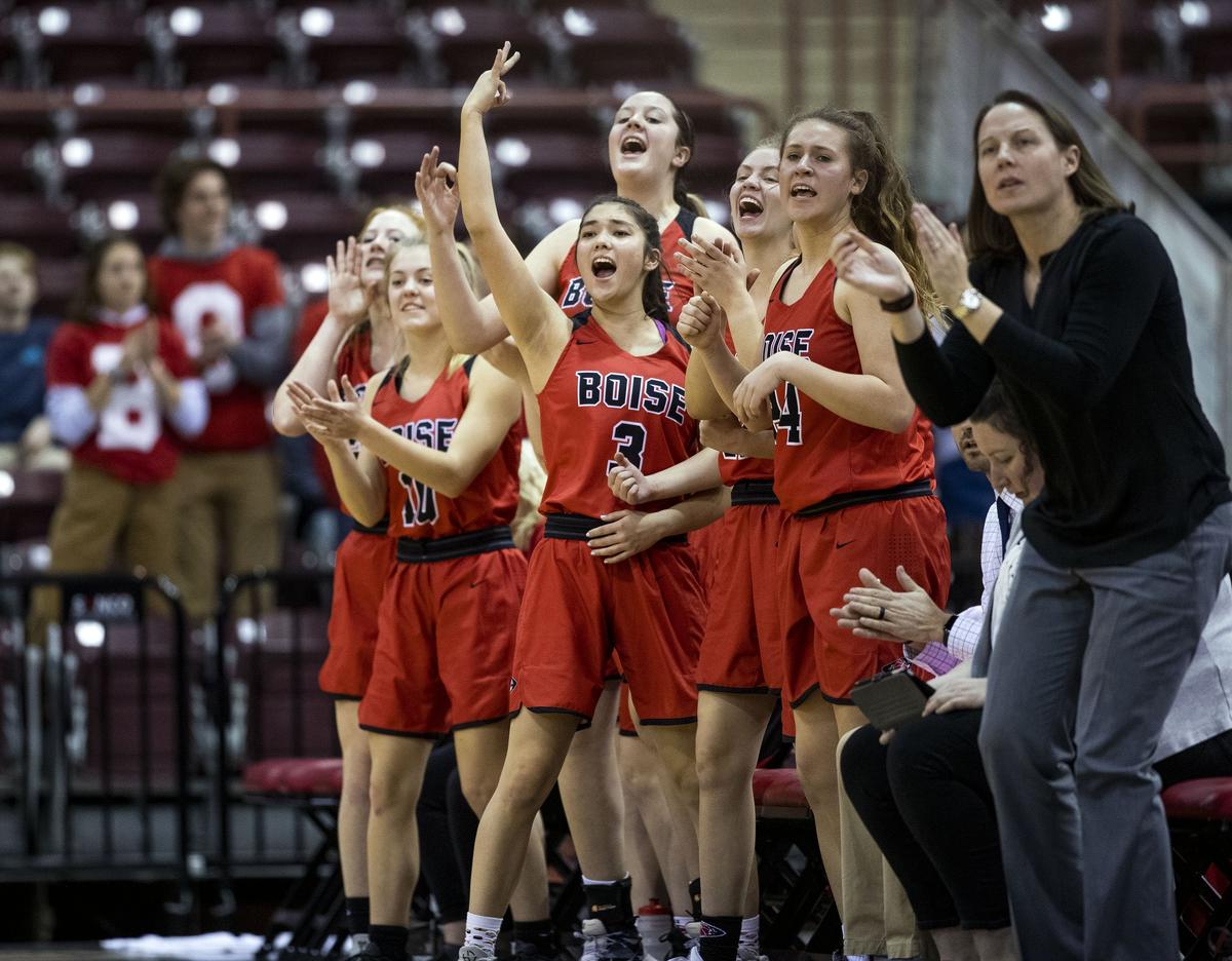 Boise’s bench celebrates a 3-pointer against Rigby in the first round of the State 5A girls basketball tournament Thursday, Feb. 14, 2019 at Ford Idaho Center in Nampa.
