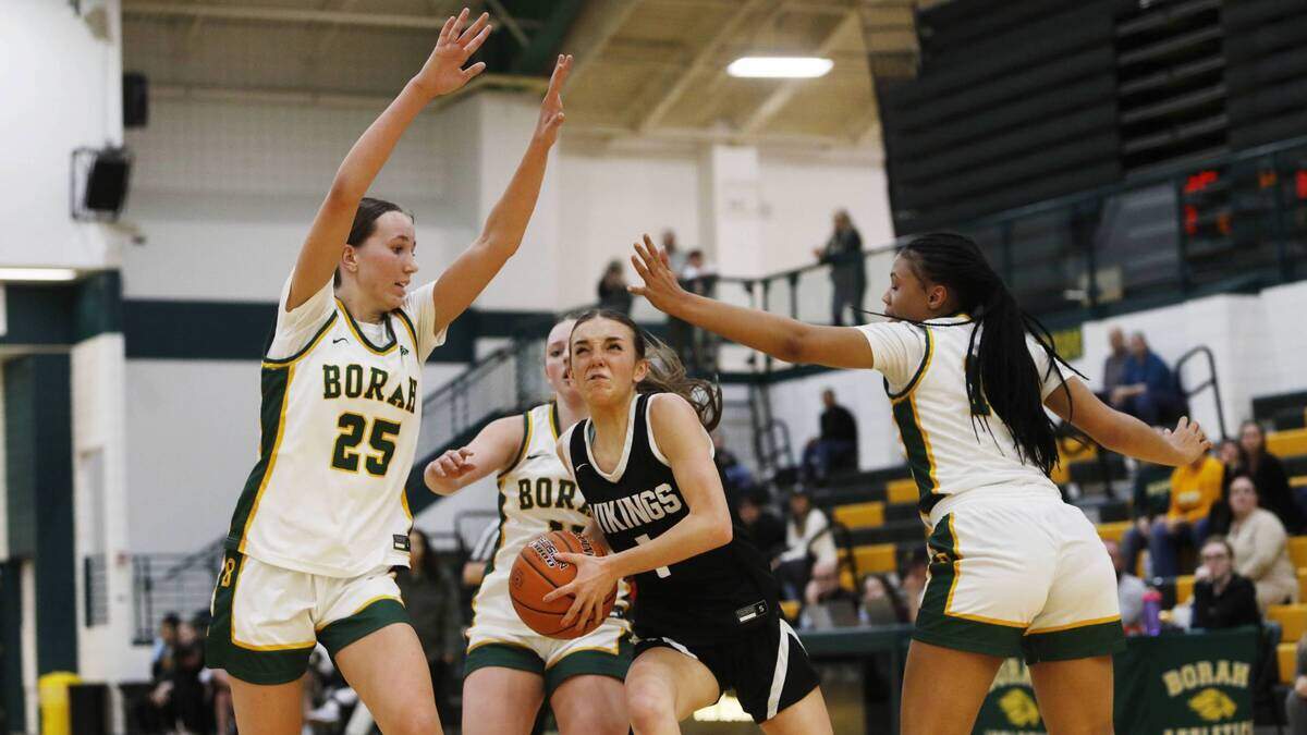 Middleton’s Zoey Blackwell slices through the Borah defense and draws a foul during the Vikings’ 51-50 win last season.