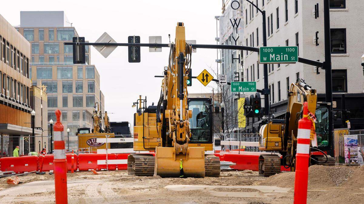 Construction equipment is parked on 11th Street north of Main Street in April 2023.