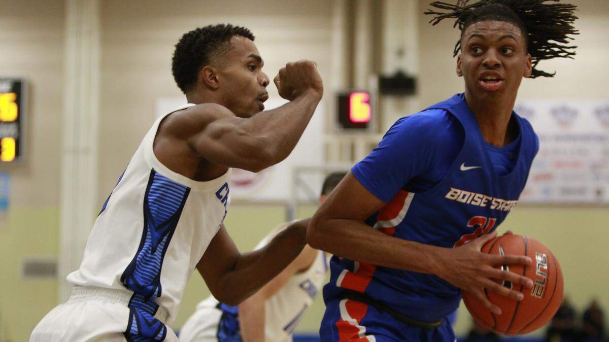 Boise State sophomore guard Derrick Alston looks to put up a shot Monday at the Cayman Islands Classic. Alston had 11 points in Boise State’s loss to Creighton.