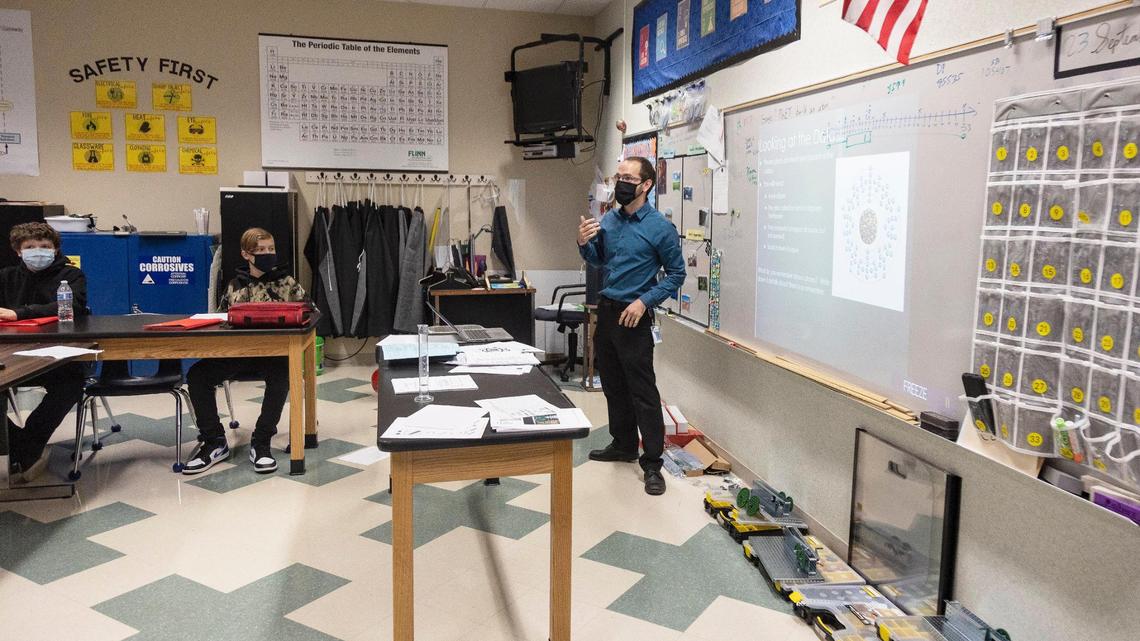 Crossroads Middle School teacher Todd Knight, who was awarded 2022 Teacher of the Year, gives a lesson in his class. Gov. Brad Little on Monday announced a proposal to increase the state’s public schools general fund by 11% that would include bonuses and raises for teachers.