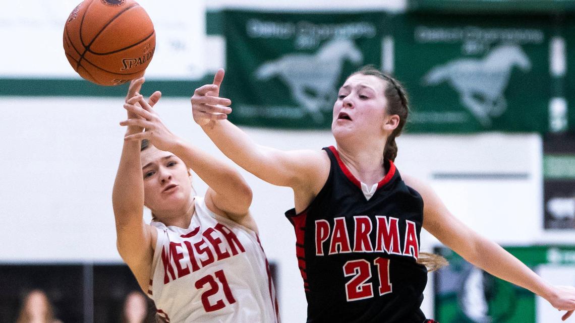 Parma forward Taylor Kaiser deflects a pass by Weiser’s Macy Maloney in the first round of 3A girls state tournament at Eagle High School on Thursday.