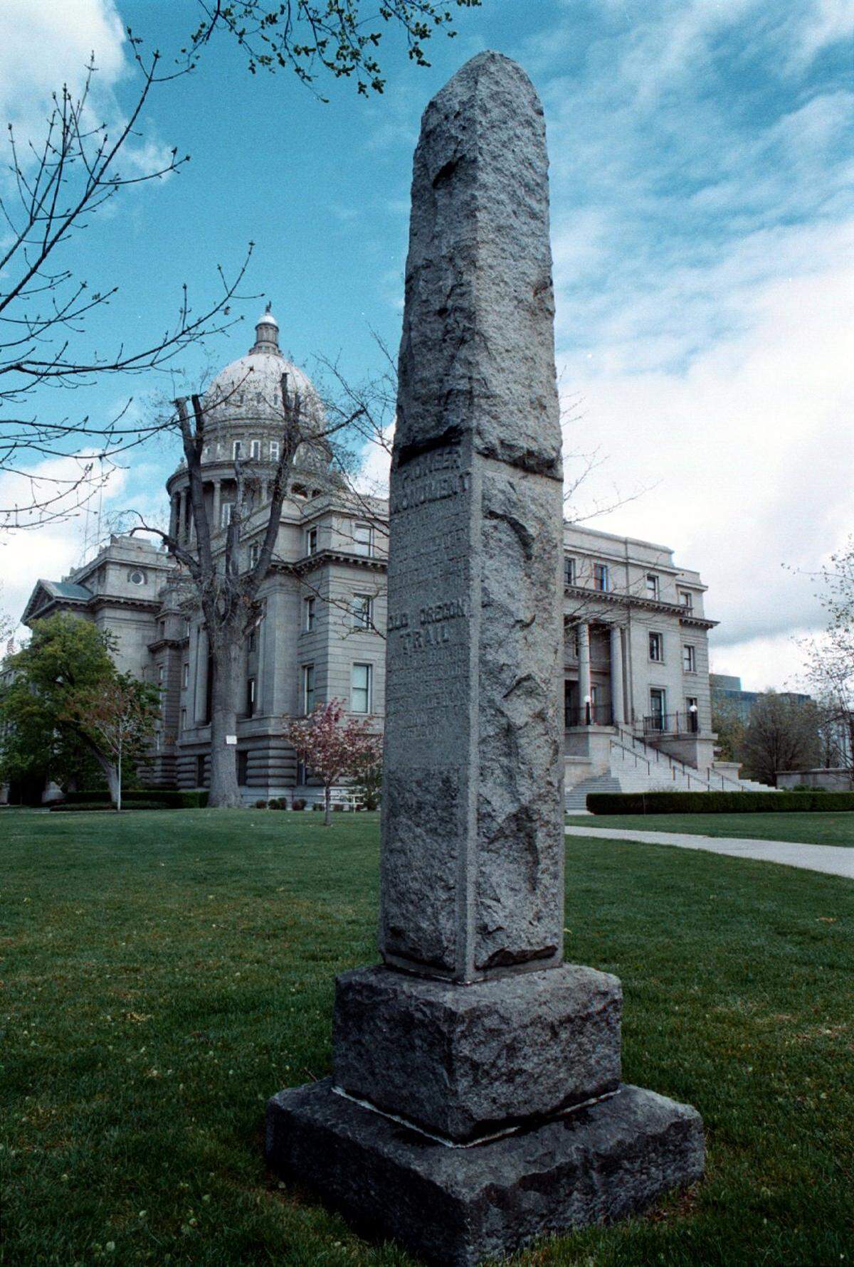 The Pioneer Monument was erected May 9, 1906, on the Statehouse lawn to honor Oregon Trail pioneers.