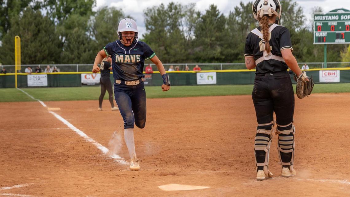 Mountain View’s Afton Janke scores the winning run against Capital in the bottom of the 7th inning Friday.