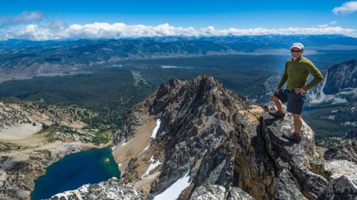 Michael Lanza stands near the summit of Thompson Peak in the Sawtooths. Lanza, an outdoors writer, was injured in a rock climbing fall in October and grappled with complicated emotions over sharing the experience on his website, The Big Outside.