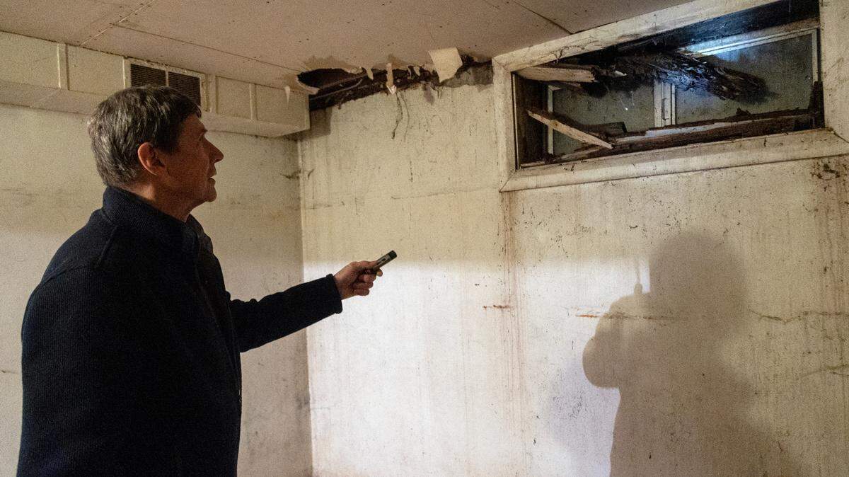 Steve Bortz, maintenance and custodian, shines a light on failing infrastructure in the unused basement area underneath Valley View Elementary School’s separate kindergarten building. Valley View is part of the Boundary County School District in Bonners Ferry, Idaho.