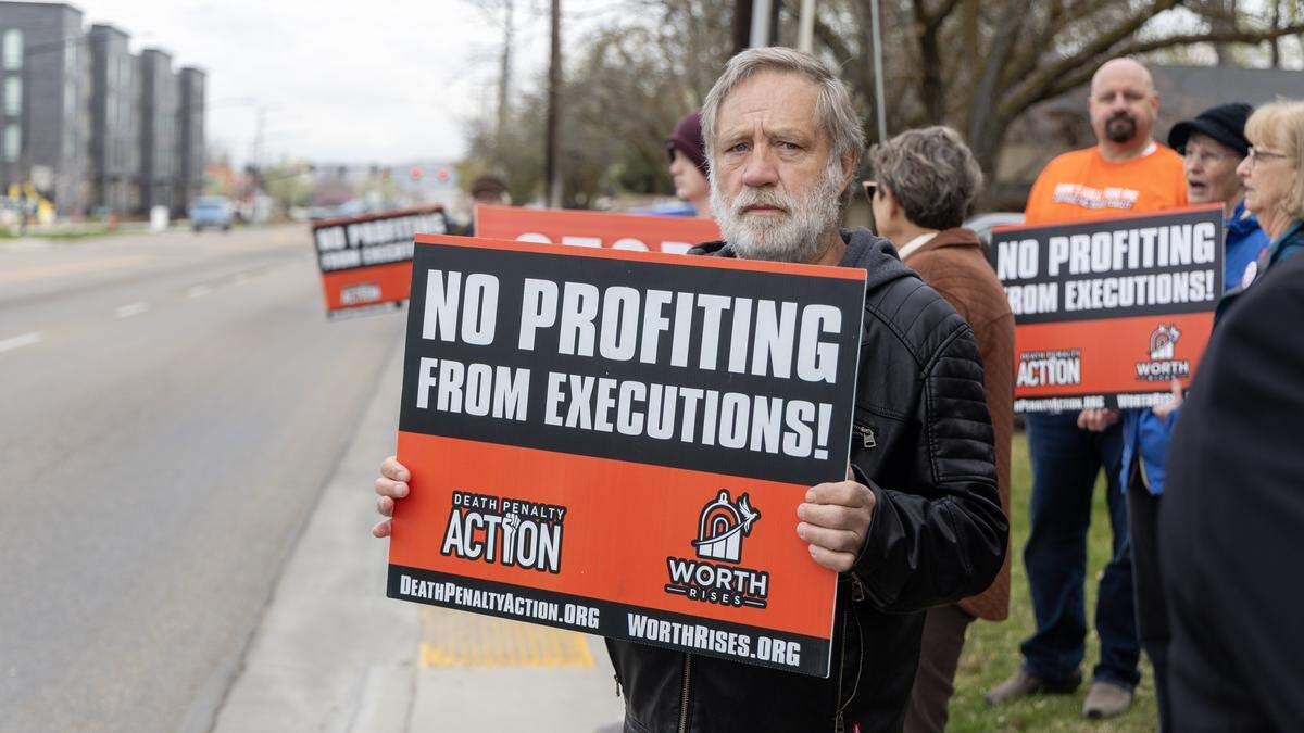 Randy Gardner participates in a protest outside of Cator Ruma and Associates. Gardner's brother, Ronnie Lee Gardner, was executed by firing squad at Utah State Prison in 2010.