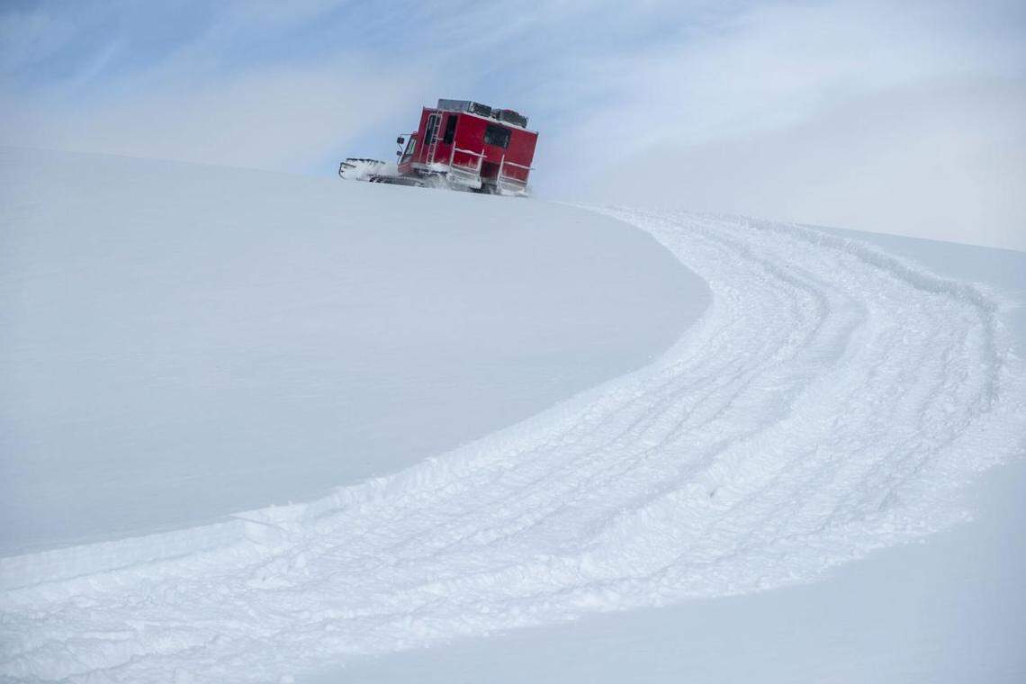 A snowcat ascends up a hill from a pickup spot during a Cat skiing trip for 12 guests Sunday, Feb. 21 at Soldier Mountain Resort north of Fairfield. Soldier Mountain is one of only two resort-based resorts that offers Cat skiing in Idaho.
