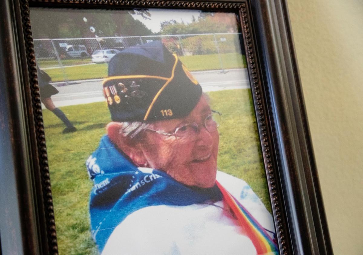 A framed photograph of Idaho Navy veteran Madelynn “Lee” Taylor sits on a piano at her sister’s home in Nampa.
