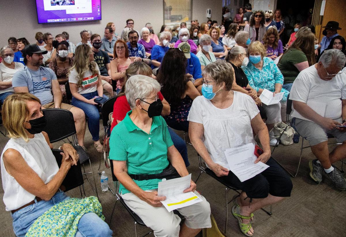 A crowd of over 100 people attend the Meridian Library District’s board of trustees monthly meeting on Wednesday, Aug. 17, 2022. During the public comment section, some citizens spoke on the issue of the role of the library in the community and on the topic of books containing nudity or depictions of sex that are available to children.