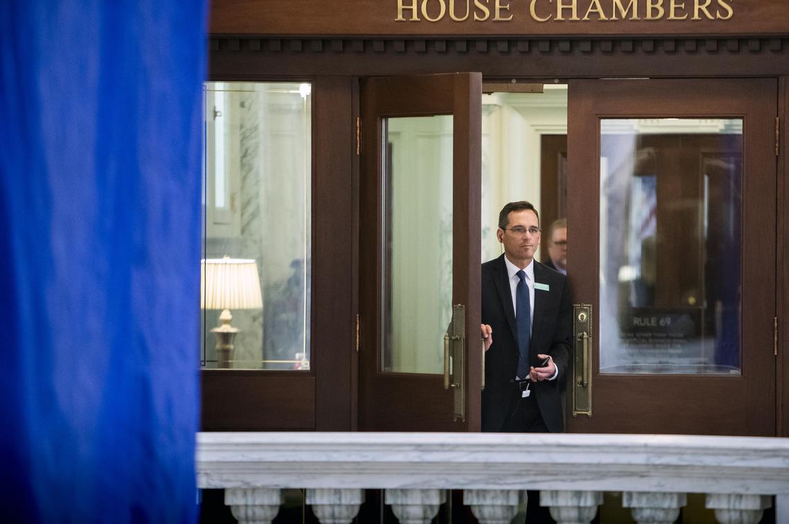 Lobbyist John Foster leaves the Idaho House Chambers lobby. Foster is a partner in Kestrel West, a lobbying and communications firm, with Kate Haas (not pictured). One of their clients, the Foundation for Government Accountability, is vying to add a work requirement for Idahoans who receive Medicaid.