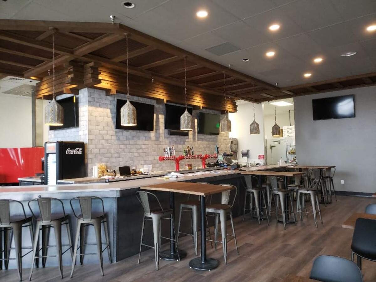 The bar area at 3 Wood Pizza & Pub, a former Garbanzo’s Pizza that was remodeled by the Duncan brothers.