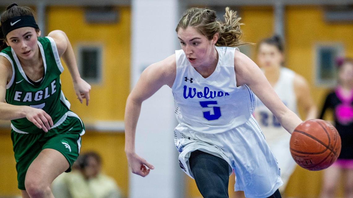 Timberline guard Ava Ranson steals the ball from Eagle’s Elise Boockholdt during their 5A SIC girls basketball game Thursday at Timberline High. The Wolves defeated the Mustangs 66-43.