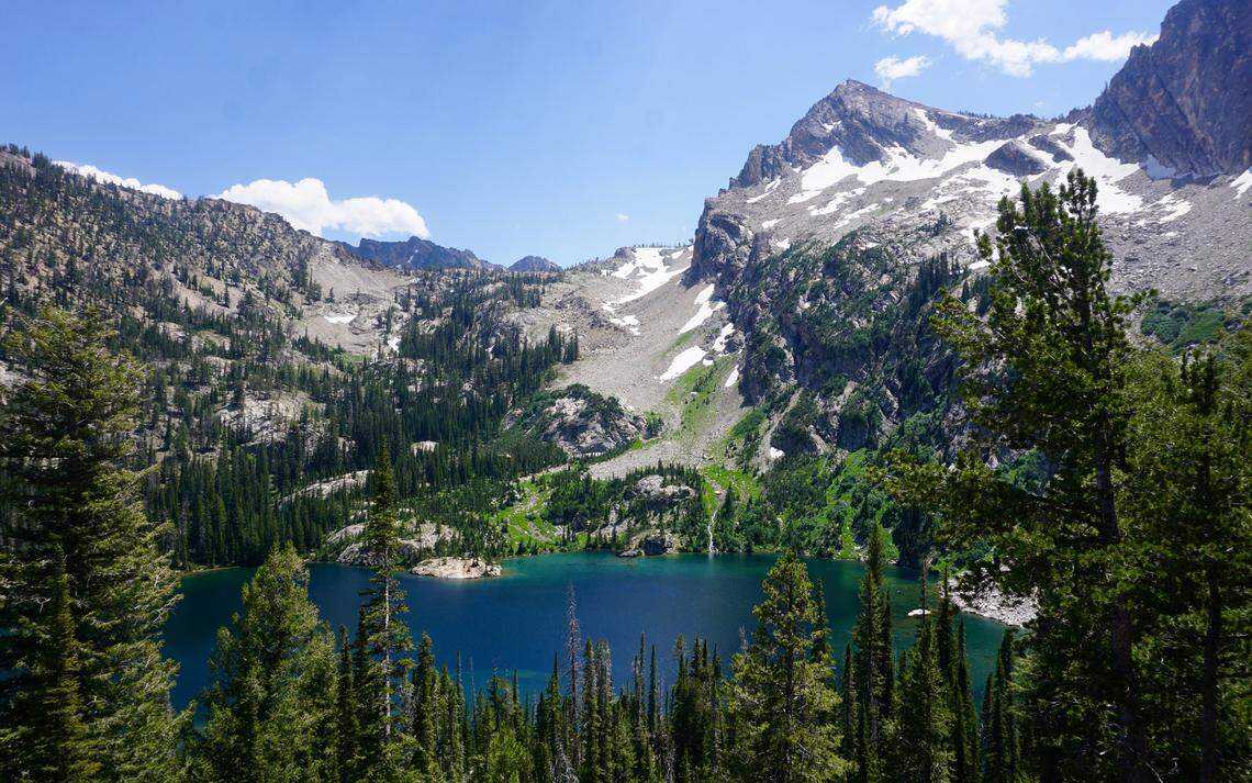 The colors of Alpine Lake, backed by Alpine Peak, provide a beautiful backdrop for photos.