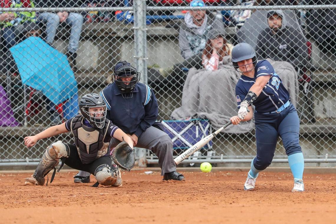 Skyview’s Summer Makinster connects with a pitch during the 5A state softball championship Saturday at Skyview High School in Nampa.