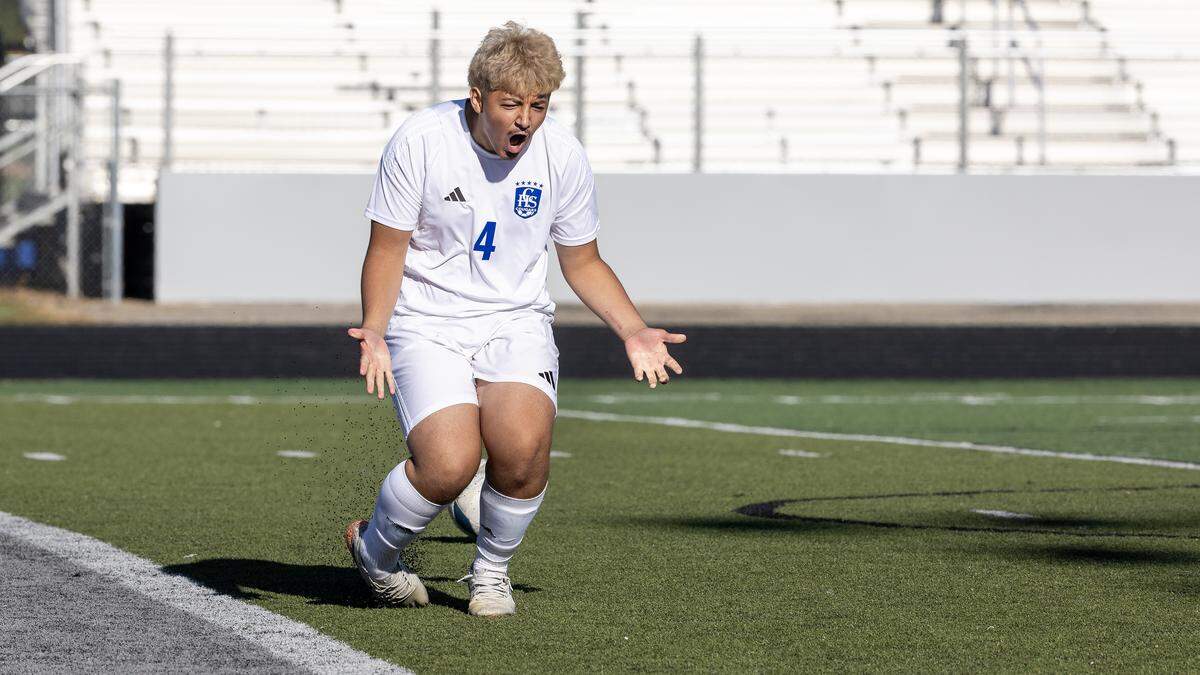 Caldwell senior Adan Gamino reacts after scoring the decisive penalty kick in a first-round victory over Mountain View at the 6A boys soccer state tournament at Eagle. 