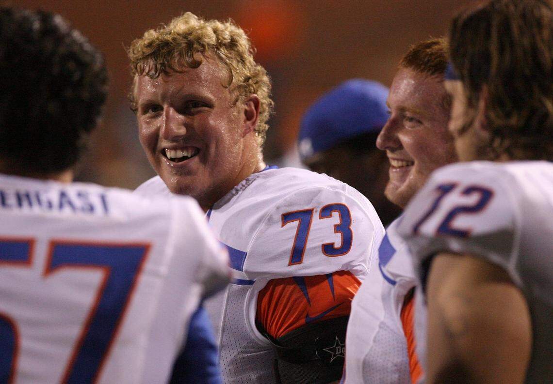 Former Boise State offensive tackle Nate Potter laughs with his teammates in the second half of a game against the Bowling Green Falcons back in his playing days.