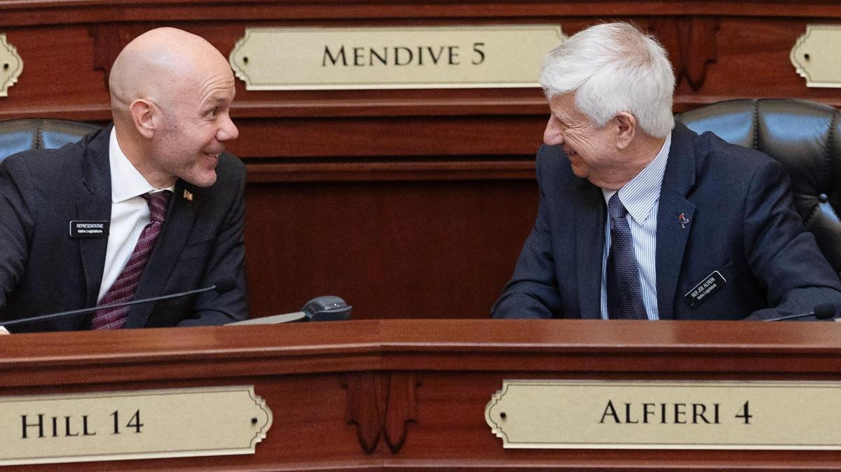 Idhao Rep. Joe Alfieri, R-Coeur d’Alene, right, proposed a law to end no-excuse absentee voting.